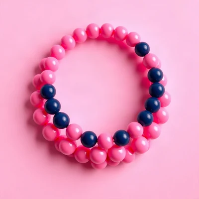 preppy pfp — beaded bracelet circle, bright pink and navy, glossy sticker finish