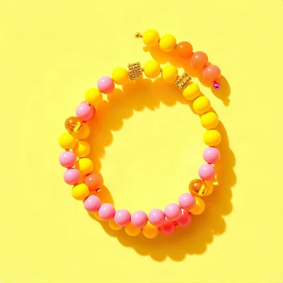 preppy pfp — beaded bracelet circle, sunny yellow and pink, glossy sticker finish