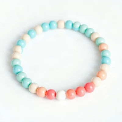 preppy pfp — beaded bracelet circle, aqua and coral, glossy sticker finish